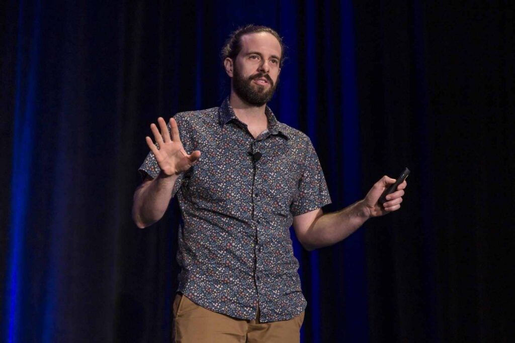 Servicetrade's shawn presenting on stage at the digital wrap conference
