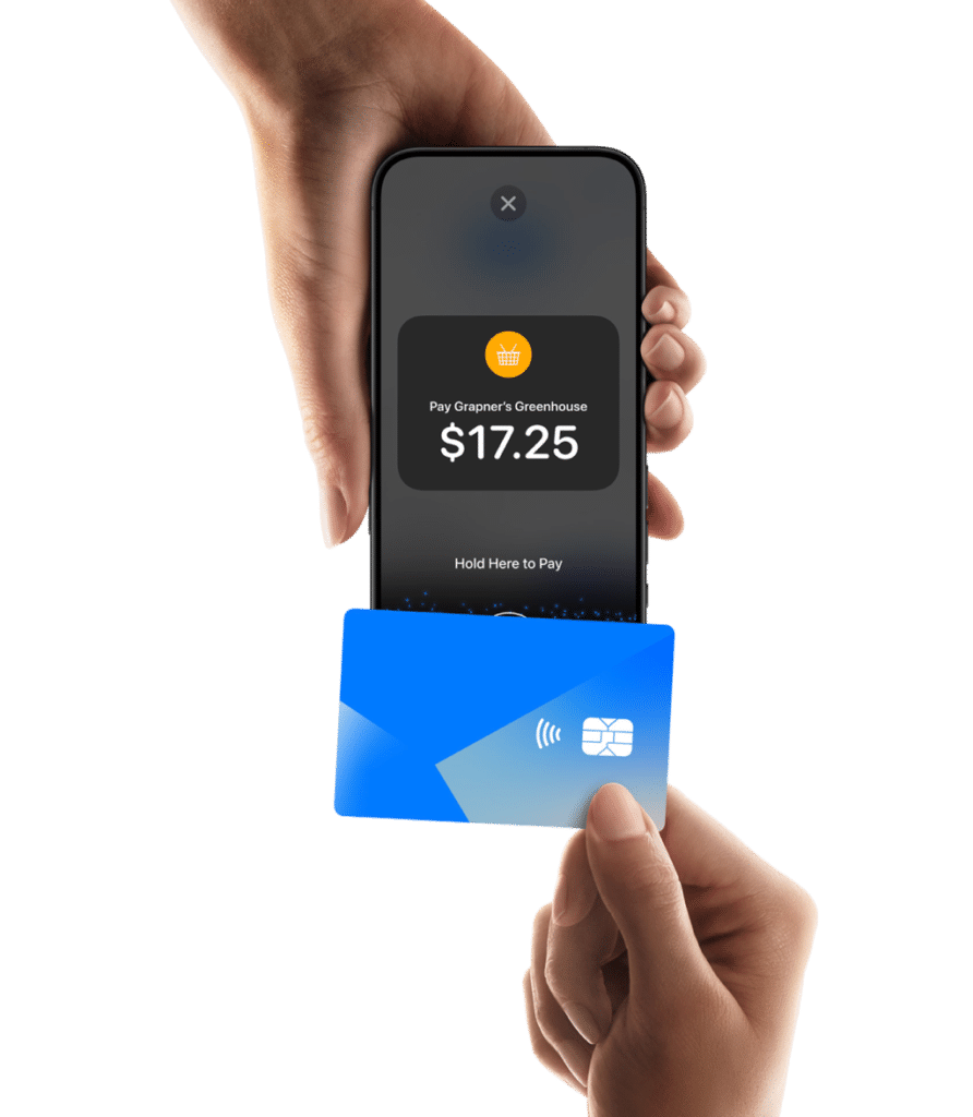 Two hands holding a cell phone and credit card to show off tap to pay feature